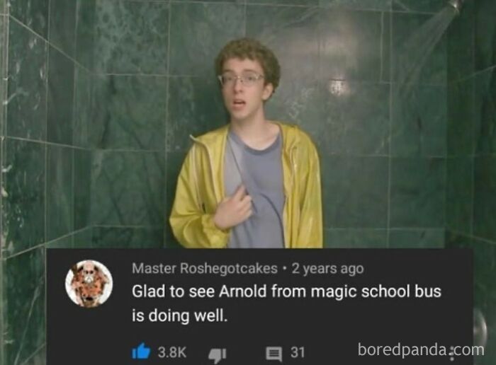 A person in a yellow jacket under a shower, with a comment comparing them to Arnold from Magic School Bus. Rare burns.