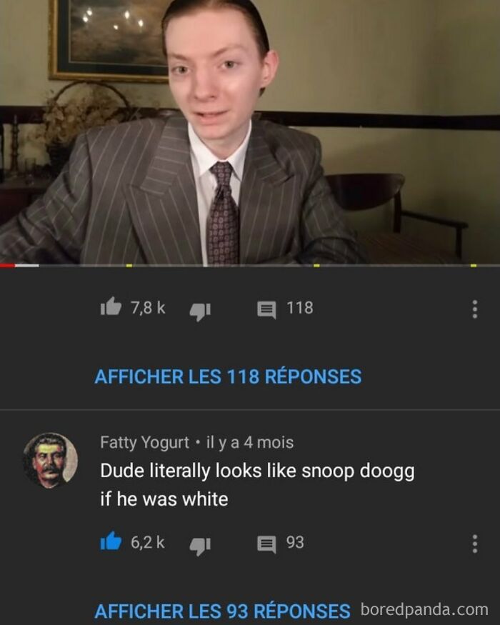 A person in a pinstripe suit and tie on a screen, with a comment below that reads: Rare Burns.