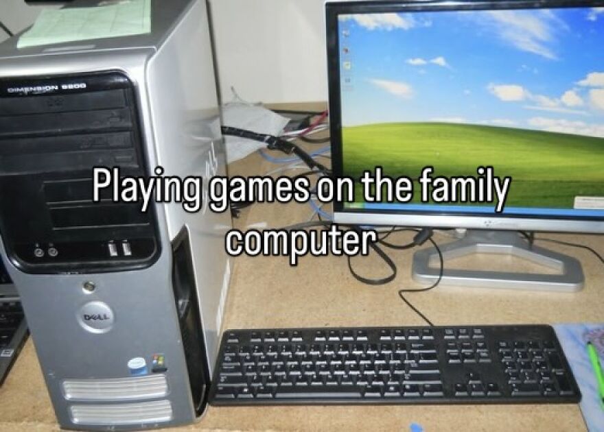 A nostalgic photo of a desktop computer set up for gaming, embodying the vibe of growing up in the 2000s.