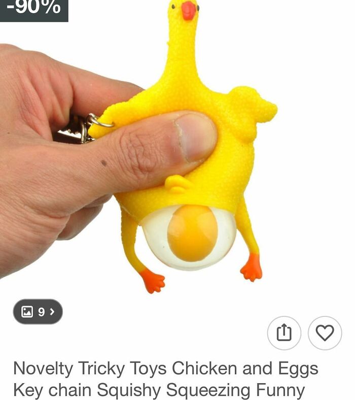 Hand squeezing a yellow chicken toy with a fake egg, illustrating surprising and funny finds while shopping on Wish.