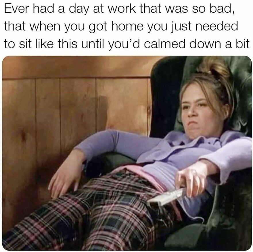 Person slouched in chair at home after a bad day at work, capturing a relatable work memes moment.