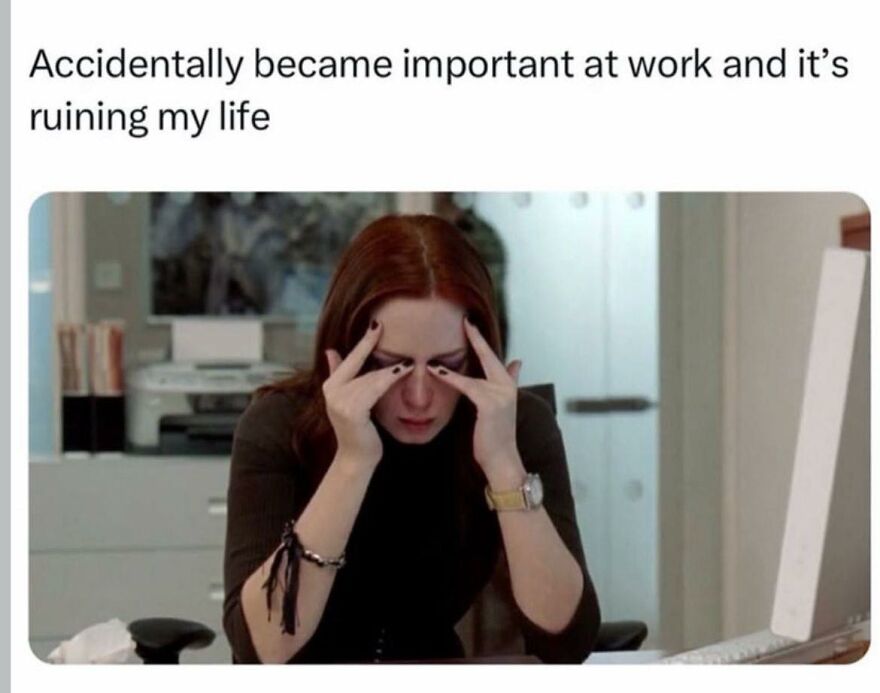 Woman stressed at work with hands on her face, expressing frustration relatable to work memes about job dissatisfaction.