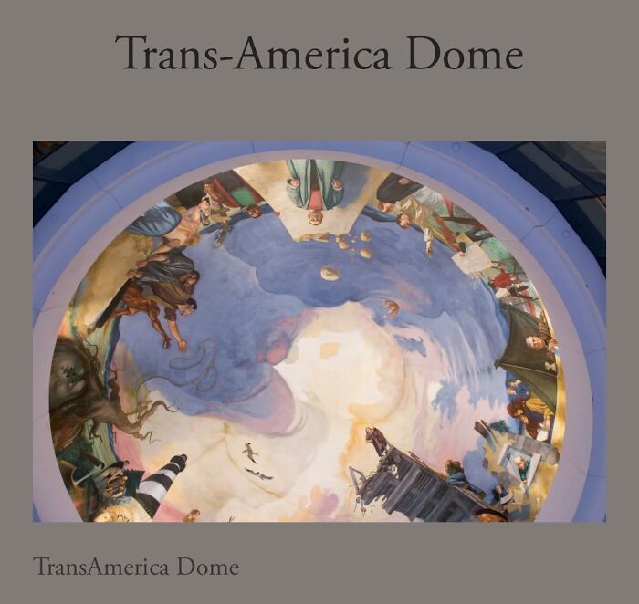 Colorful mural inside Trans-America Dome depicting historical figures and scenes under a large circular painted ceiling.