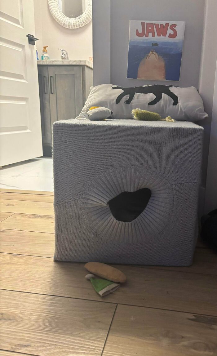 A handmade pet bed, disguised as an ottoman, reflecting a creative and talented handmade project.