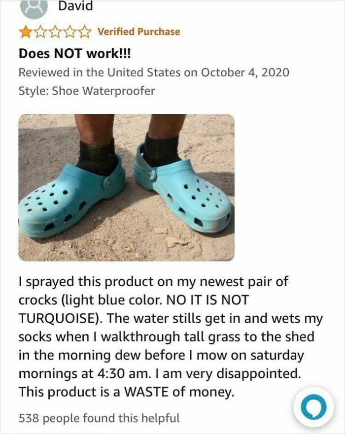 Negative Amazon review with photo of worn blue Crocs, highlighting waterproofing failure in a hilarious product critique.