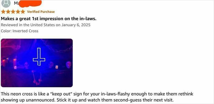 Verified Amazon review showing a neon inverted cross sign described as a bold eyeliner alternative that won’t run.