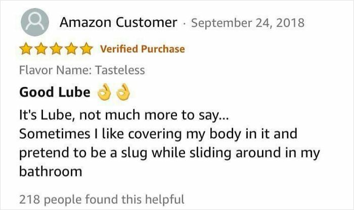 Amazon customer review with five stars praising a product, mentioning good lube and humorous body sliding comment.