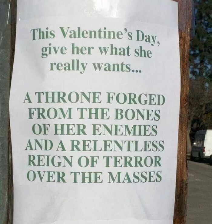 Funny pieces of advice on a Valentine’s Day sign suggesting a throne forged from enemies’ bones for a relentless reign.