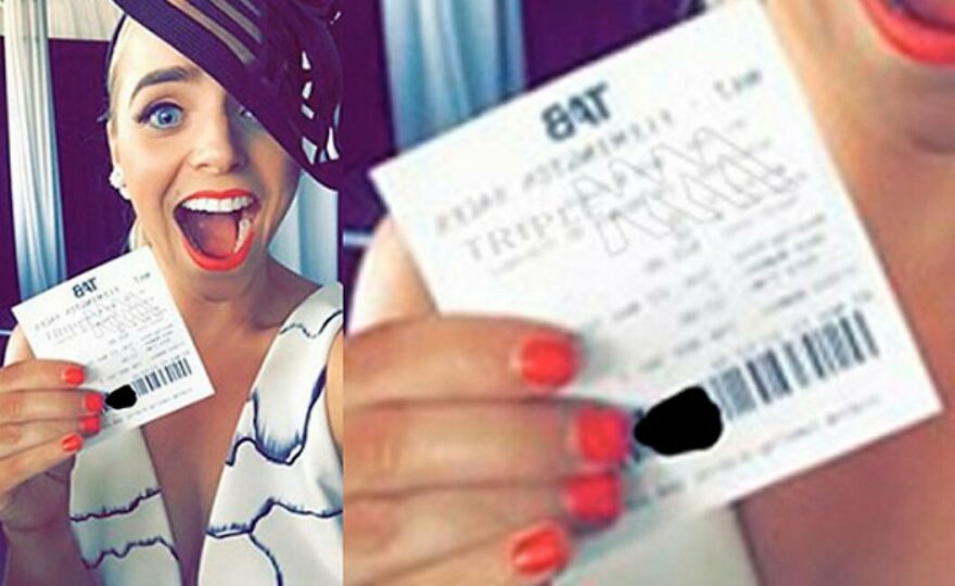 Woman excitedly holding a ticket, smiling broadly, representing joy in learning interesting and fun facts.