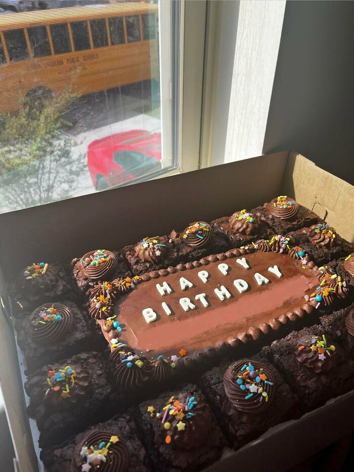 Chocolate birthday brownies decorated with sprinkles and lettering