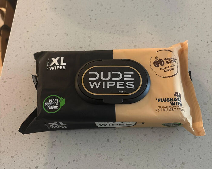 A packet of DUDE WIPES XL, a consumerism product for men infused with coffee.