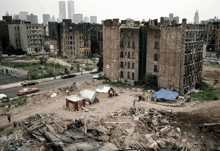 Urban hell scene with dilapidated buildings and rubble in a deserted city area