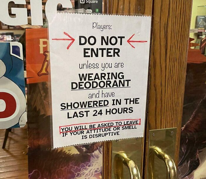 A white sign on a wooden door with specific rules: "DO NOT ENTER unless you are WEARING DEODORANT and have SHOWERED IN THE LAST 24 HOURS." This oddly specific rule makes you wonder.