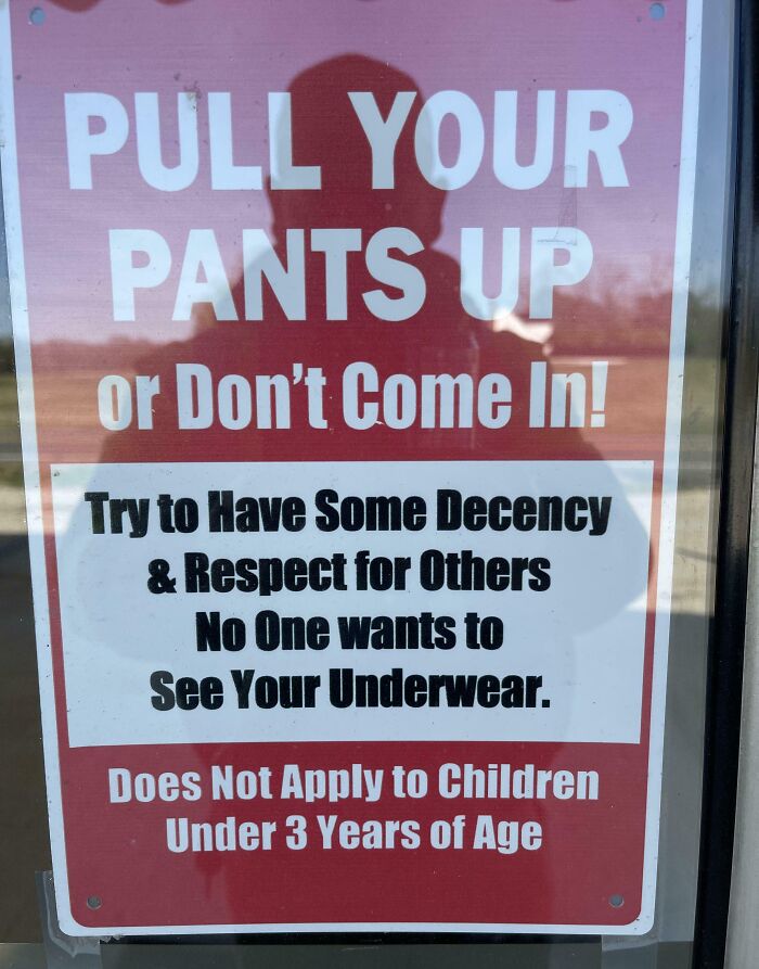 A humorous sign, reflecting a specific rule about modesty. It says, "Pull your pants up or don't come in! No one wants to see your underwear."