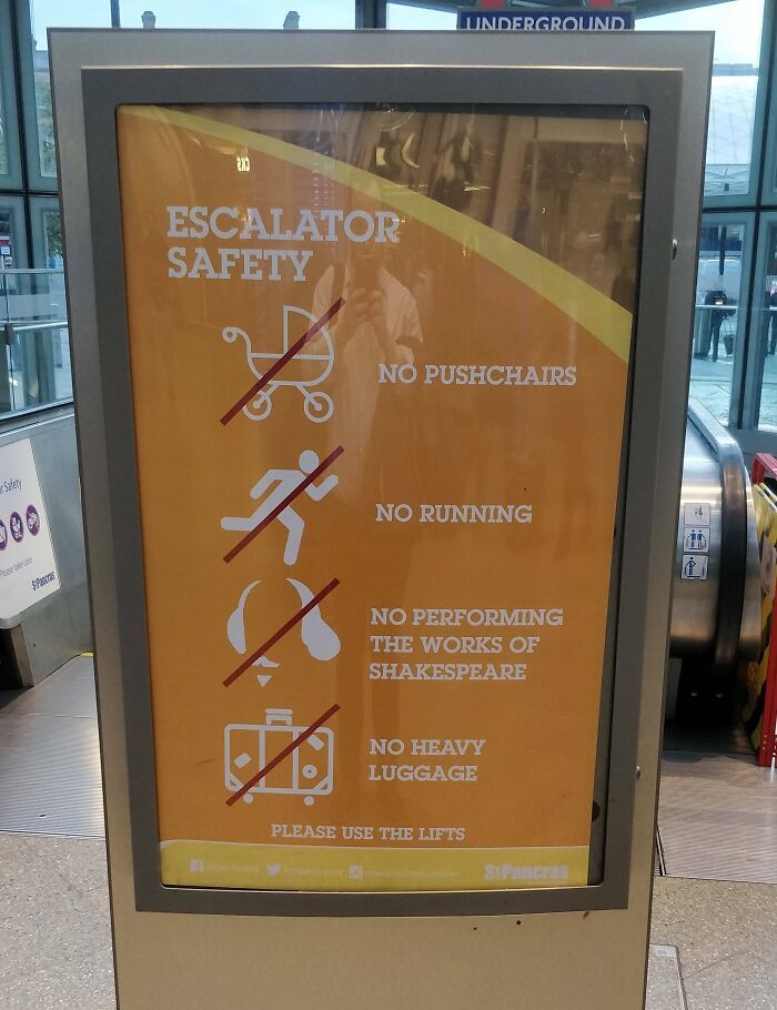 Escalator safety sign with oddly specific rules: no pushchairs, running, Shakespeare, or heavy luggage. Underwear must be worn.