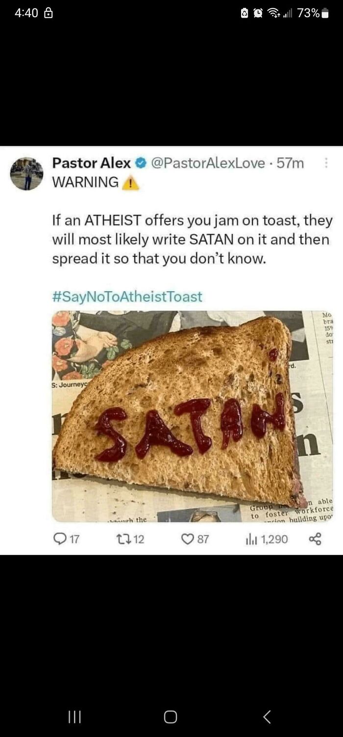 Tweet warning about atheist toast with jam spelling satan, illustrating depressing posts about living in the stupidest time in history.