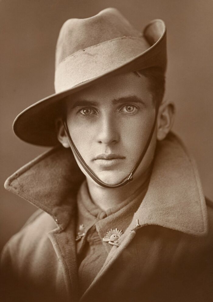 Sepia portrait of a young soldier wearing a slouch hat and vintage military uniform from a rare and interesting photo era.
