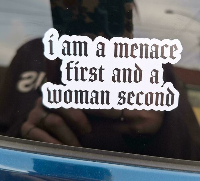 A funny bumper sticker reads, I am a menace first and a woman second. This unfiltered bumper sticker provides a double take.