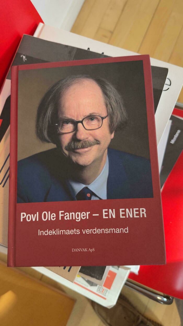 A man with a mustache and glasses on the cover of a book, displaying bad hair mistakes.