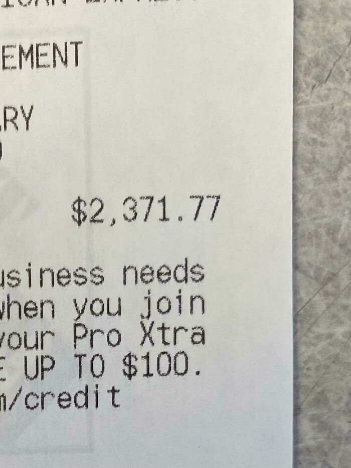 A printed Home Depot receipt showing a total of over two thousand dollars