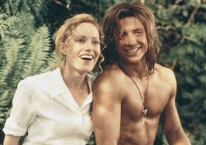 Brendan Fraser and Leslie Mann smiling in a 90s kid movie, representing nostalgic memes.