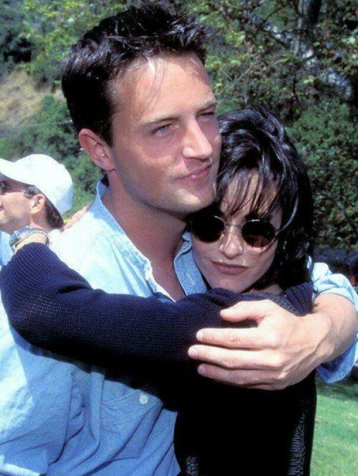 Matthew Perry hugging Courteney C*x, a nostalgic meme reminding 90s kids of their childhood TV show Friends.