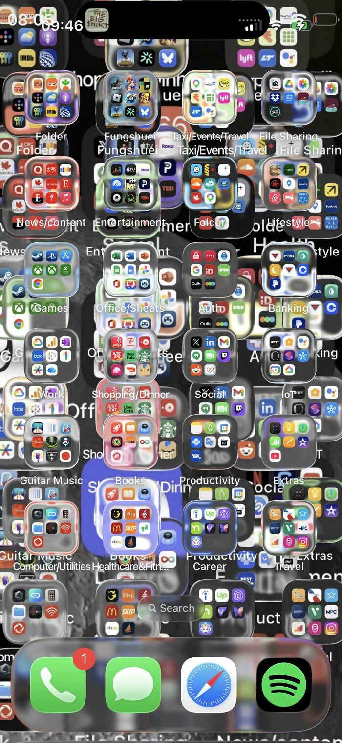 An iPhone screen filled with various app icons, from the Not Interesting Community.