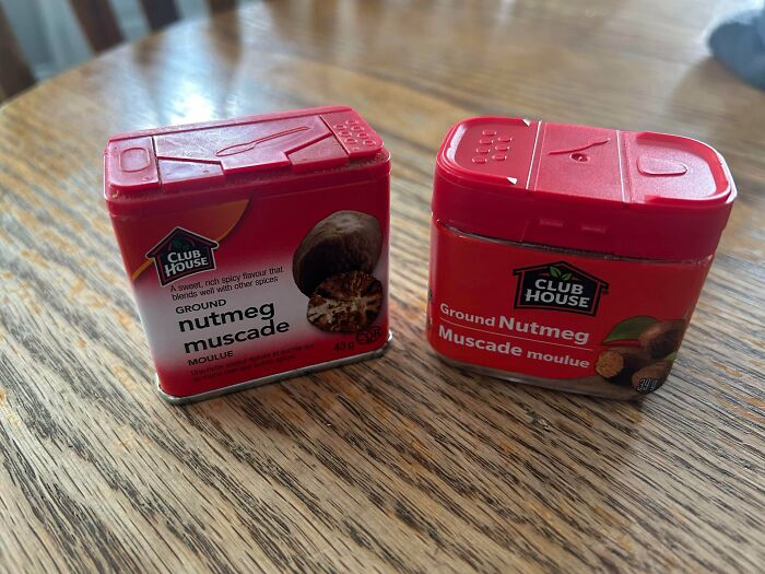 Two different Club House ground nutmeg spice containers on wooden table