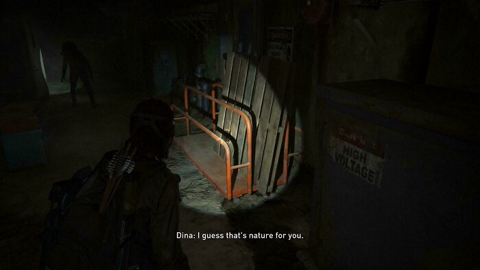 Videogame character with flashlight near lumber flatbed cart resembling Home Depot equipment
