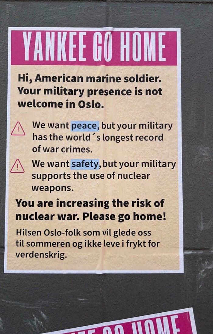 Protest poster in Oslo warning American military to leave, addressing peace, safety, and risk of nuclear war in life in America.