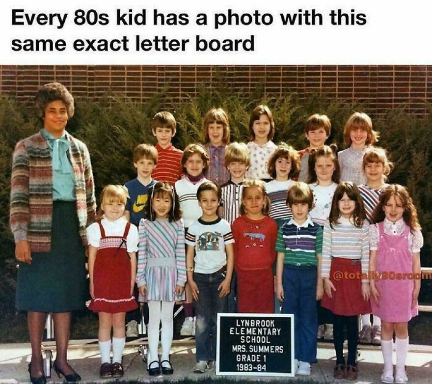 Group photo of 1980s elementary school kids and teacher with vintage letter board showing parts of 80s life.