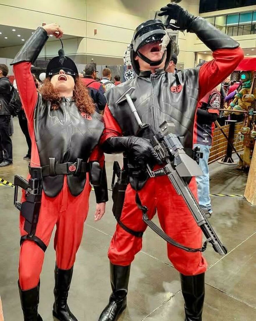 Two people in 80s style costumes eating snacks, showcasing parts of our lives from the 80s that no longer exist.