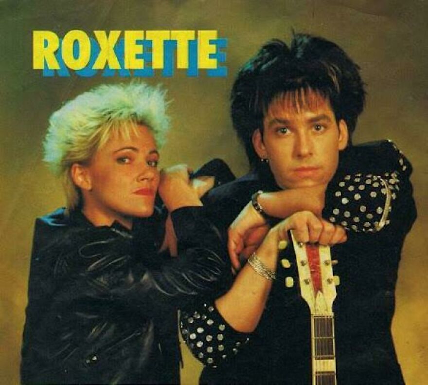 80s music duo Roxette posing with vintage fashion and hairstyle, showcasing iconic parts of 80s culture and style.