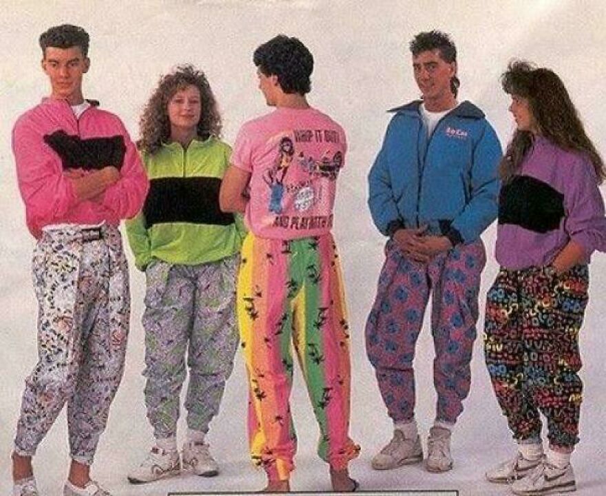 Group of young people wearing colorful 80s fashion, showcasing styles from posts about the 80s and vanished lifestyle trends.