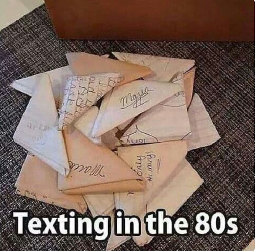 Folded handwritten notes representing texting in the 80s showing nostalgic parts of our lives that don’t exist anymore.