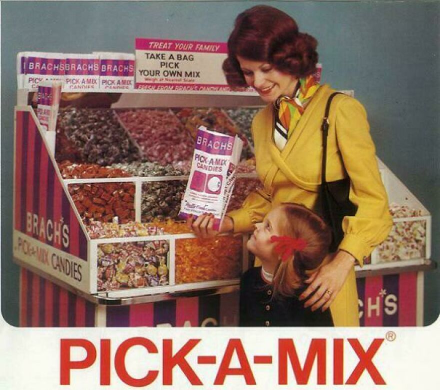 Mother and child at a vintage 80s pick-a-mix candy counter showing parts of our lives that don’t exist anymore