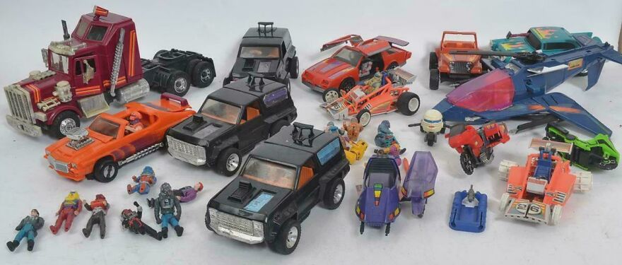 Collection of ’80s toy cars and action figures showcasing nostalgic parts of lives that don’t exist anymore.