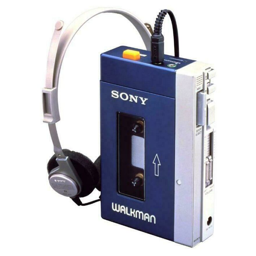Vintage Sony Walkman with headphones, classic 80s music device showing parts of lives that don’t exist anymore.