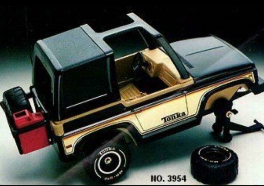 Vintage Tonka toy truck from the 80s with a missing tire, showing a nostalgic part of childhood play that no longer exists.