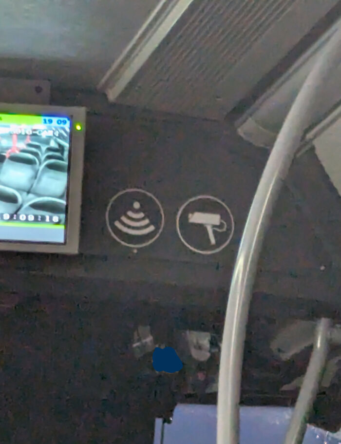 An upside-down camera icon next to a signal icon on a screen showing empty seats, a weird upside-down thing to fix.