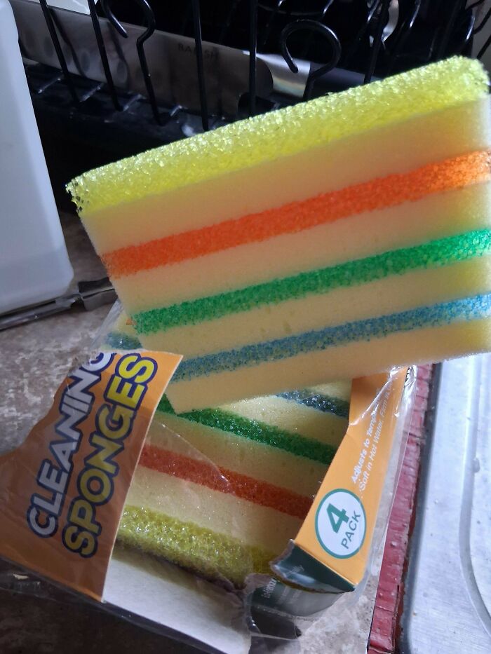 Cleaning sponges with their stripes misaligned, a funny you had one job fail.