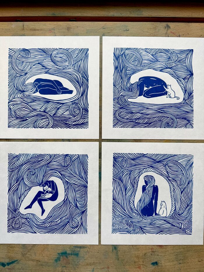Four handmade blue and white linocut prints feature stylized figures with swirling patterns, demonstrating artistic talent.