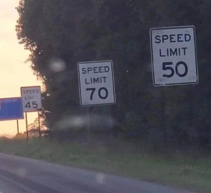 Multiple confusing speed limit signs showing 45, 70, and 50 mph on a roadside, highlighting funny and confusing signs.