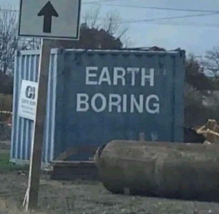 A confusing and funny sign that humorously reads Earth Boring at a construction site.