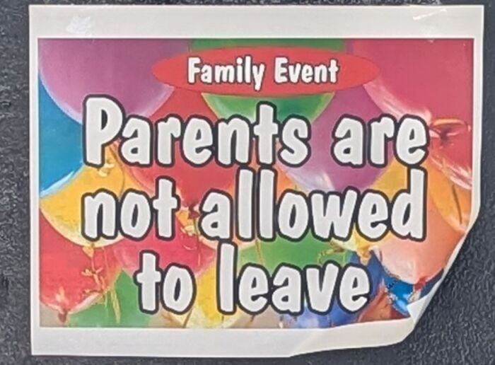 Funny and confusing family event sign with colorful balloons stating parents are not allowed to leave, a humorous bees sign example