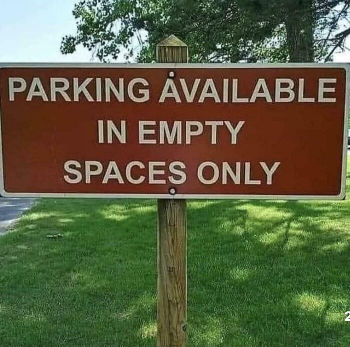 Confusing and funny sign about parking available in empty spaces only, illustrating quirky and humorous messages.