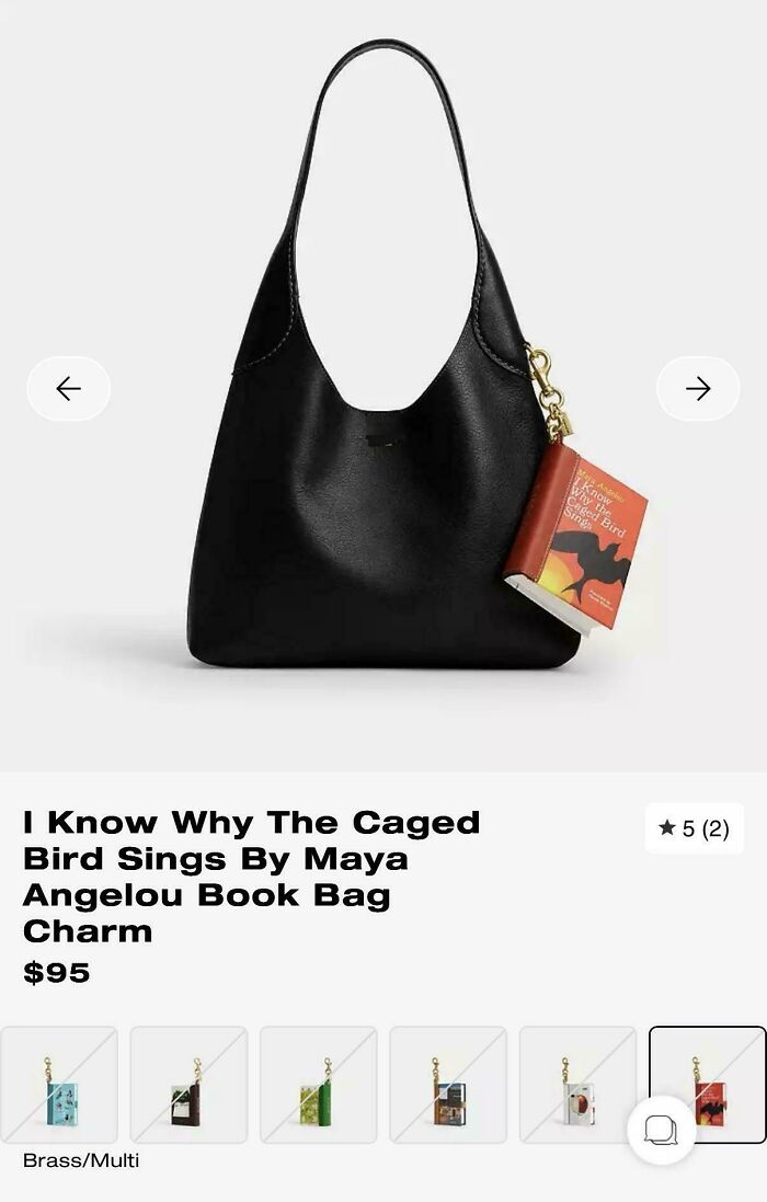 A black handbag with a miniature book charm showcasing the consumerism of Maya Angelou's I Know Why The Caged Bird Sings.