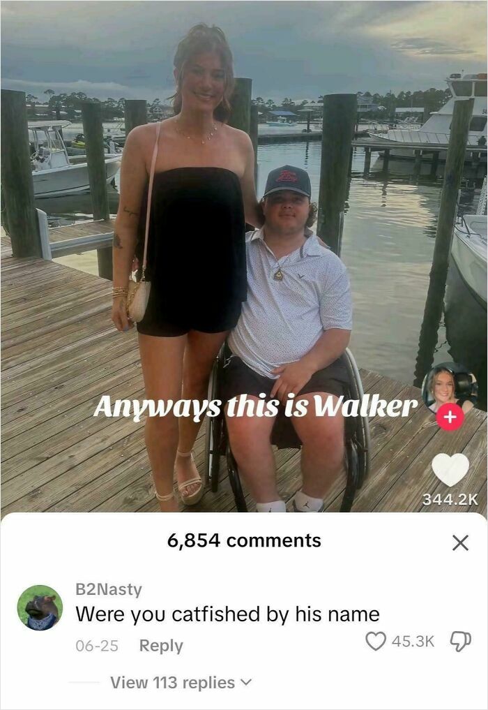A woman stands next to a man in a wheelchair on a dock. Text reads, "Anyways this is Walker." A comment below reads, "Were you catfished by his name." This is an epic burn example.