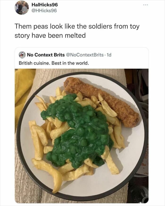 A plate of British cuisine, chips with mushy peas and a battered sausage, receiving an epic burn.