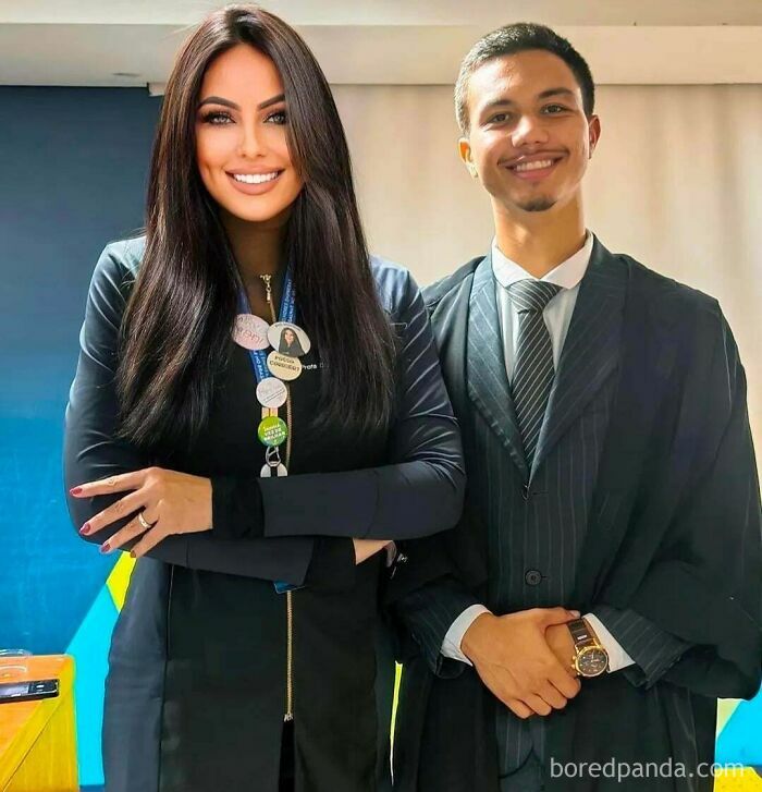 Two people smiling and posing indoors, showcasing wild Instagram edits that distort real human faces.